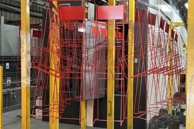 Peinture industrielle - 500 présentoirs à journaux